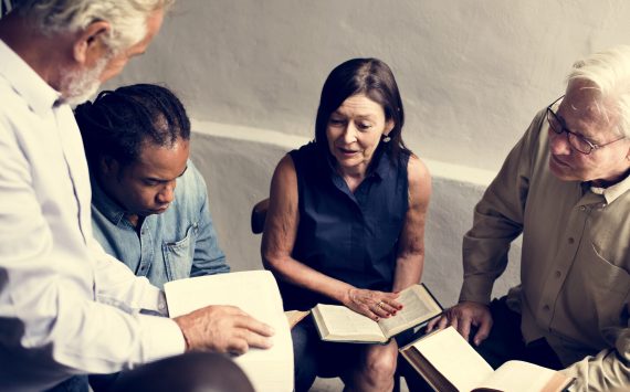 Group christianity people reading bible together